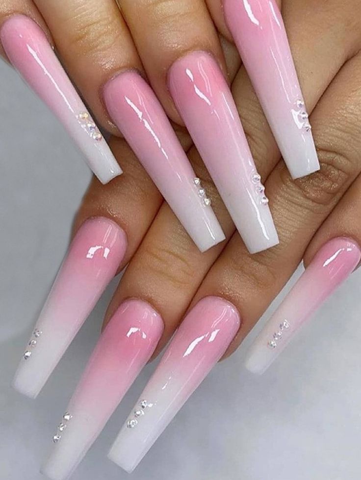 Elegant Ombre Gradient Nail Design in Soft Pink and White Tones.