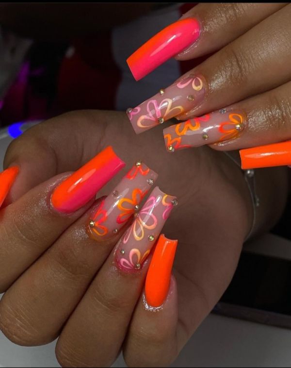 Bold Neon Floral Nail Design: A Striking Statement of Color and Elegance