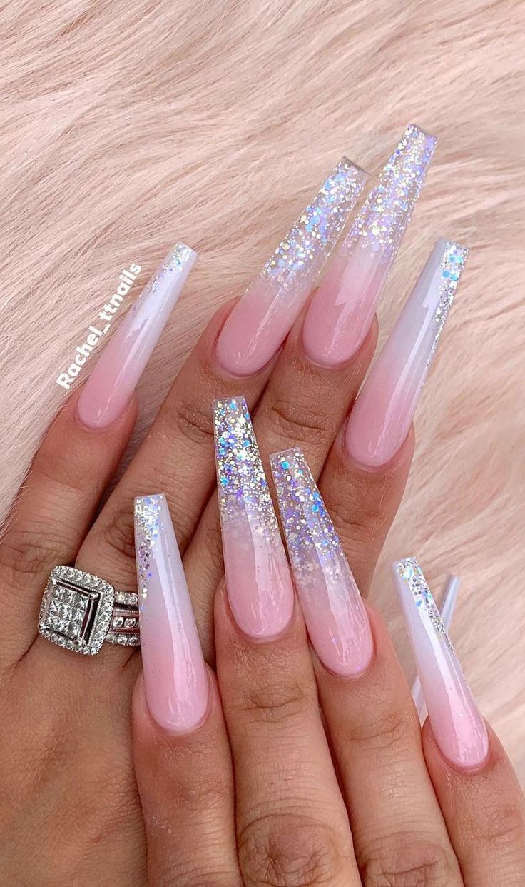 Elegant Glittery Ombre Nails: Soft Pink and White with Sparkling Tips for Any Occasion.