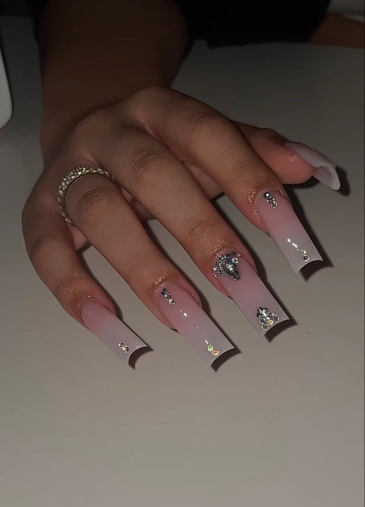 Chic Gradient Long Nails with Rhinestones and Metallic Heart Design.