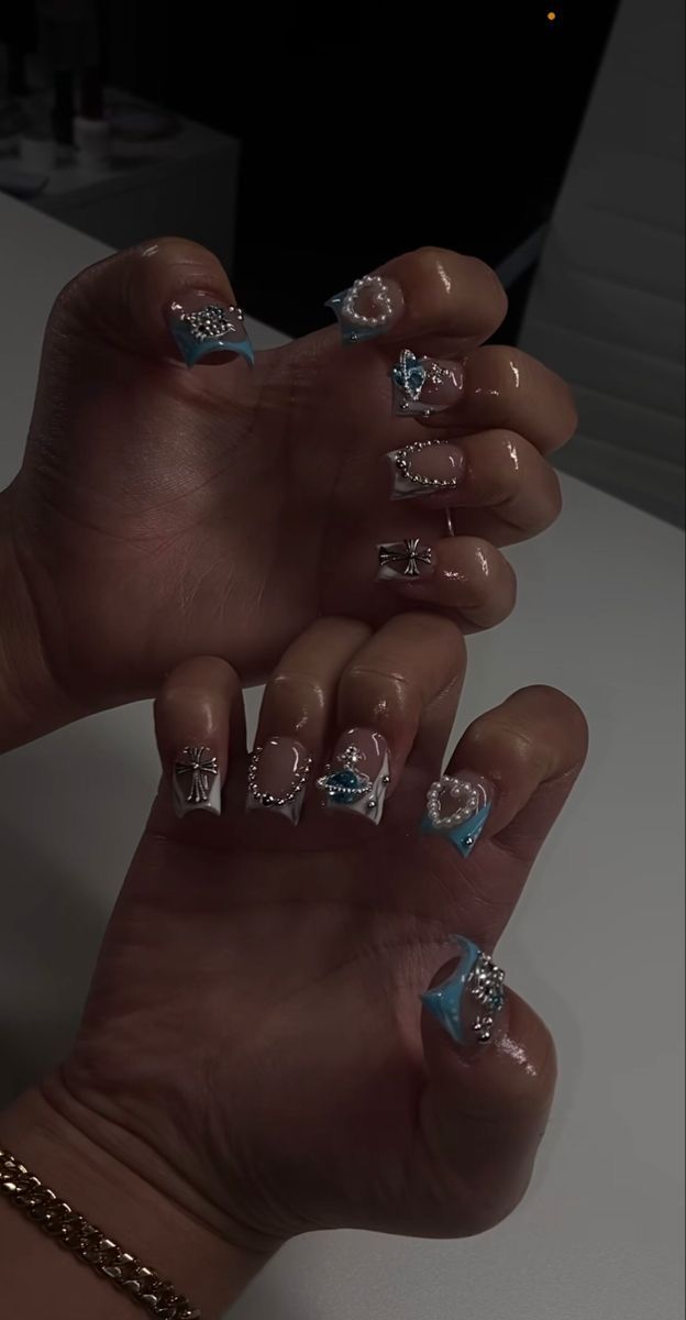 Elegant Blue-Tipped Nail Design Adorned with Rhinestones and Pearls