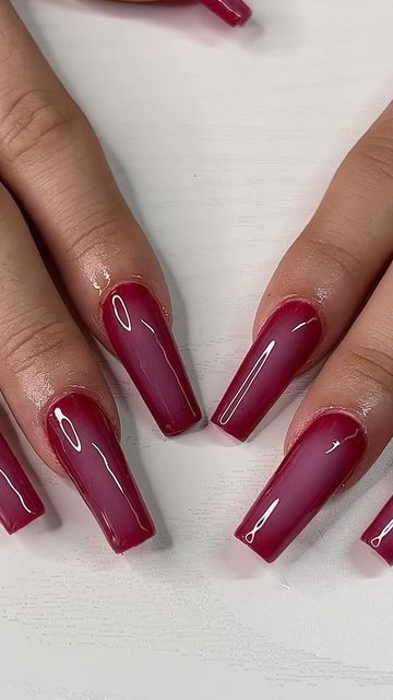 Sophisticated Glossy Burgundy Nails with Chic Gradient Design for Any Occasion