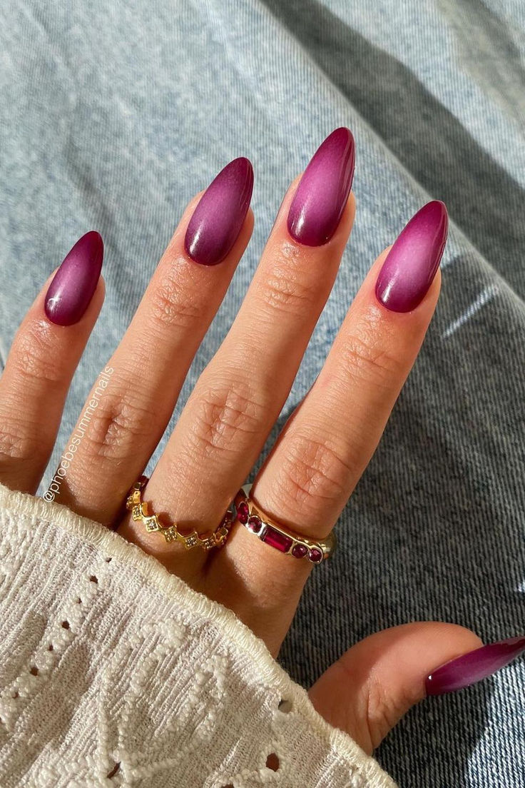 Elegant Ombre Purple Nails with Gradient Design and Almond Tips for a Chic Look.