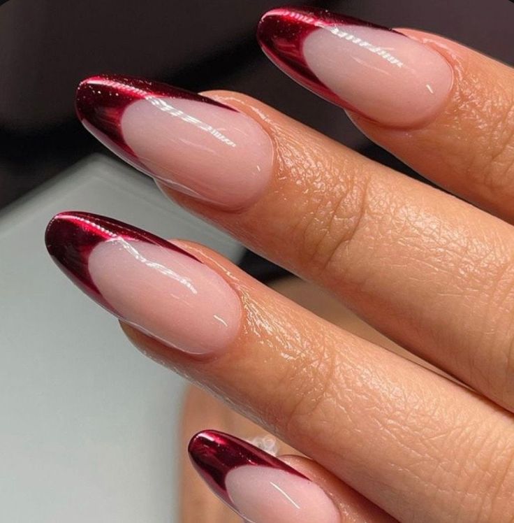 Sophisticated Almond-Shaped Burgundy and Nude Nail Design for Any Occasion.