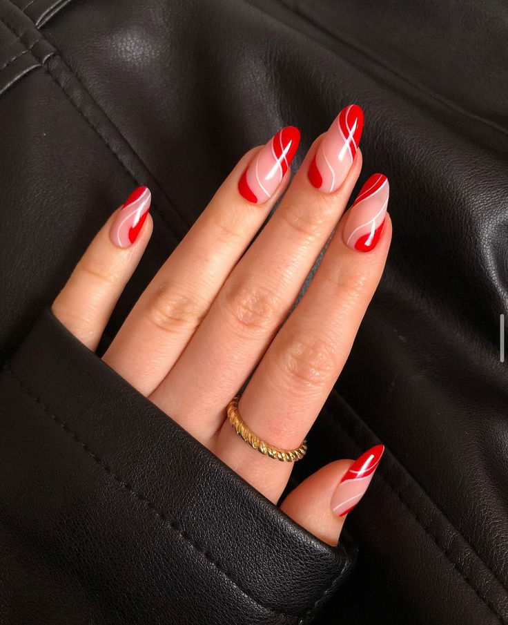 Chic Bold Nail Design: Striking Red and Soft Nude with Dynamic White Curves