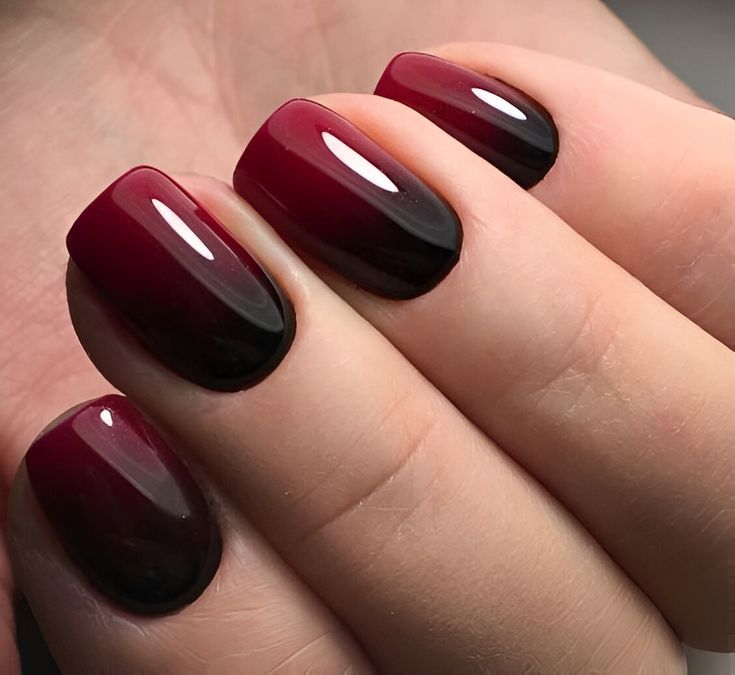 Elegant Gradient Nail Design: Deep Burgundy to Sleek Black for Bold Sophistication.