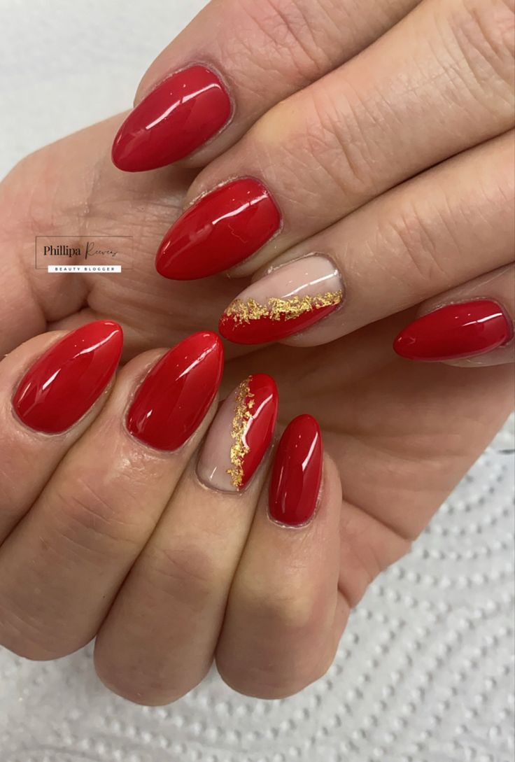 Chic Red Nail Design with Glossy and Matte Finishes and Elegant Gold Accents.