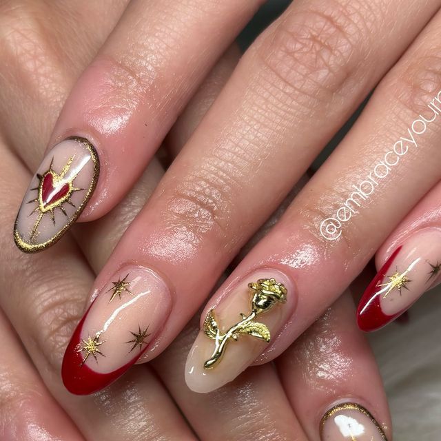 Chic Nail Design: Bold Red Tips with Gold Accents and Heart Motif