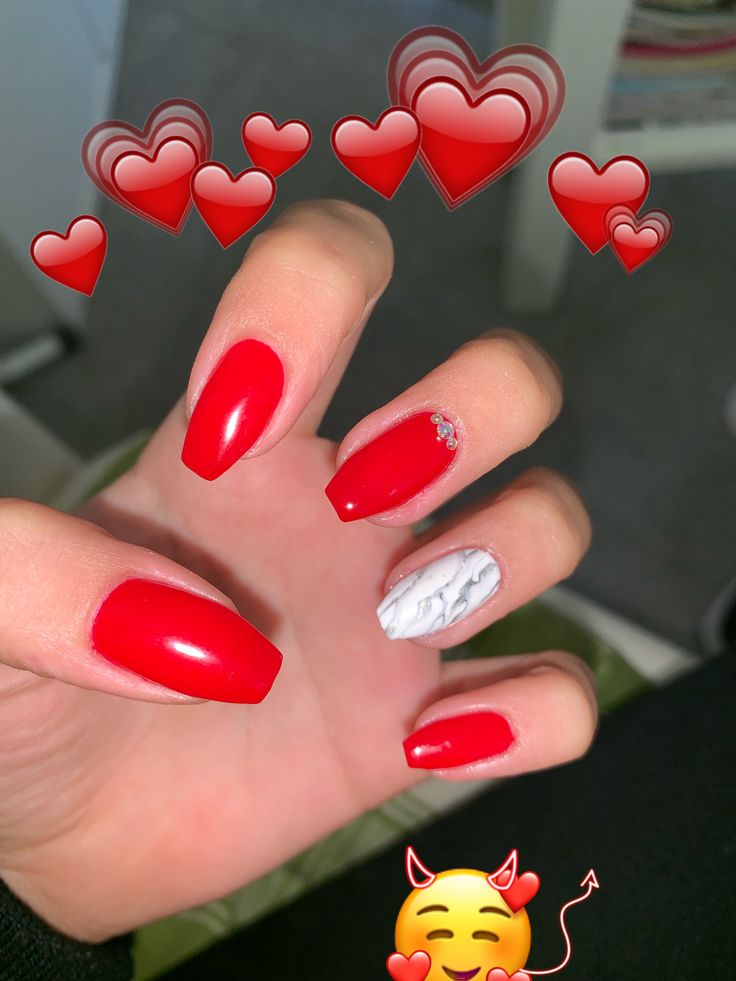 Chic Vibrant Red Nail Design with Elegant White Marble Accent