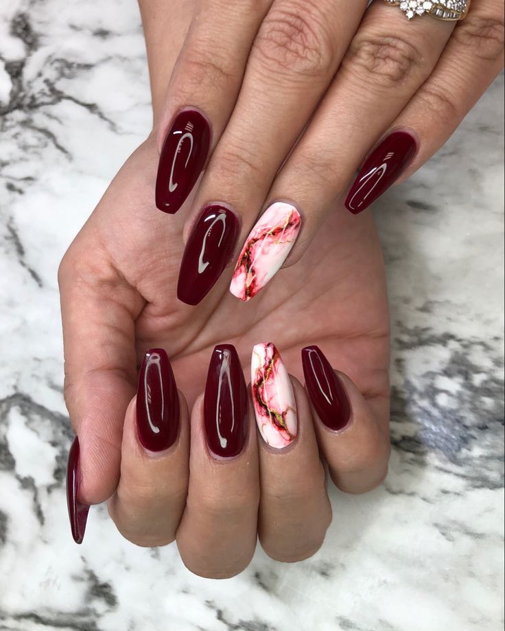 Sophisticated Deep Burgundy Nail Design with Striking Marbled Accent