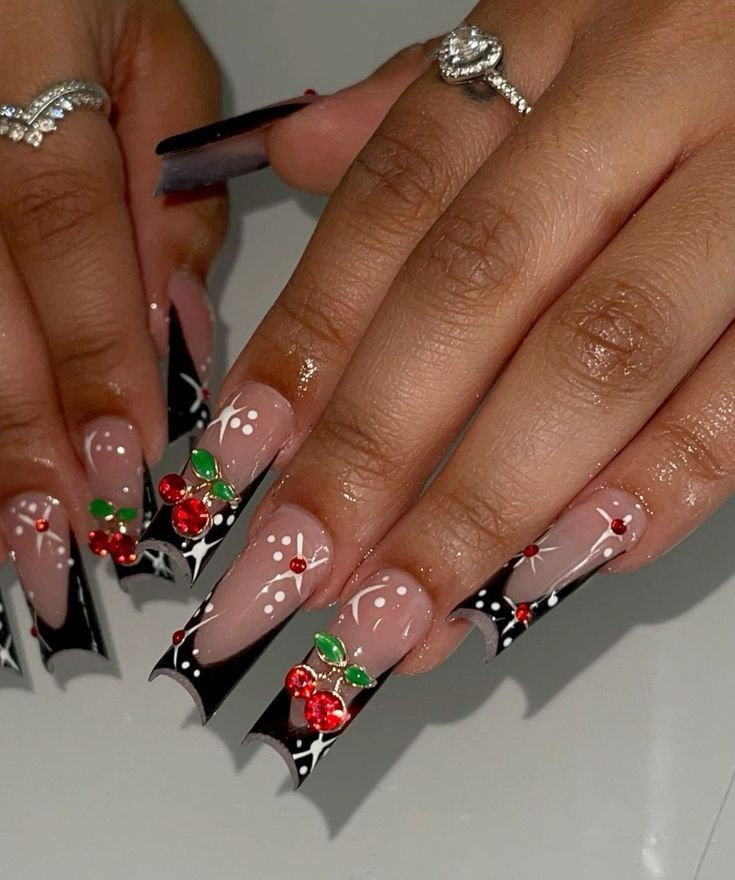 Elegant Nail Design: Elongated Tips with Black Manicure, Hand-Painted Green Leaves, Red Cherries, and Delicate White Accents for Festive Sophisticatio