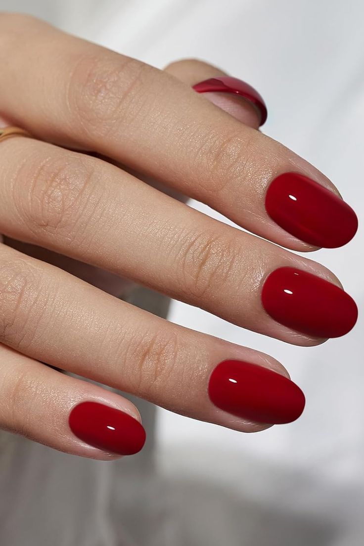 Sophisticated Elegance: Glossy Red Nails for Any Occasion.