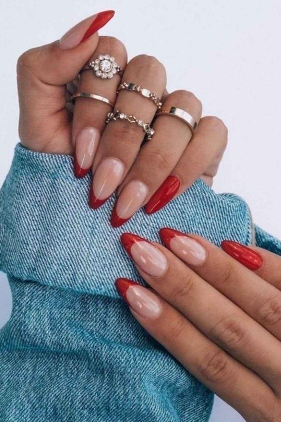 Chic Almond-Shaped Manicure with Elegant Nude and Bold Red Color Combination