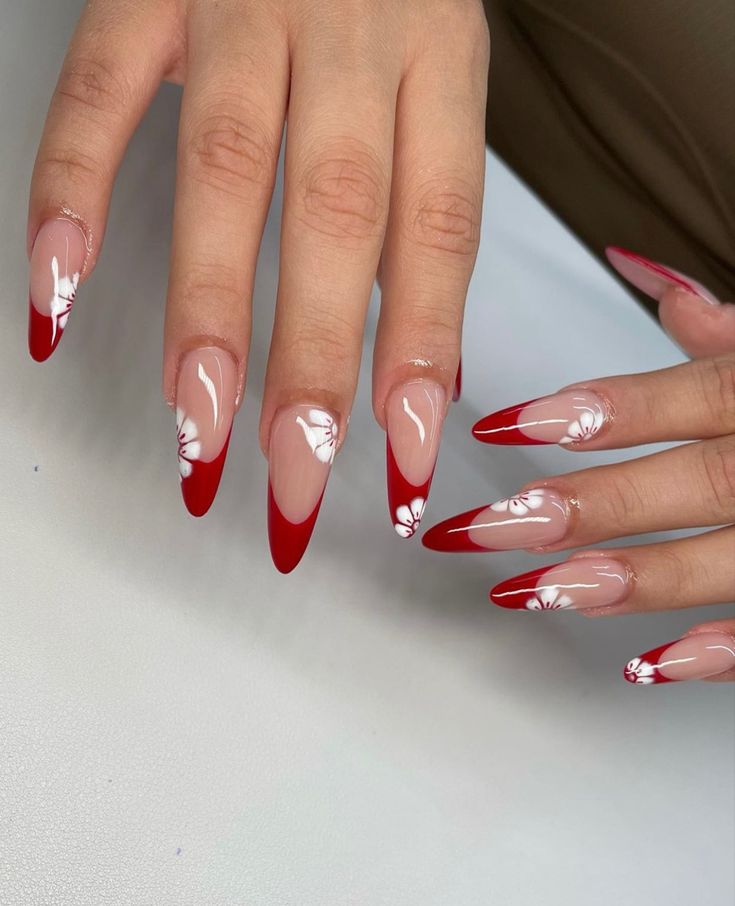 Striking Elegant Red and Nude French Tip Nails with Floral Accents