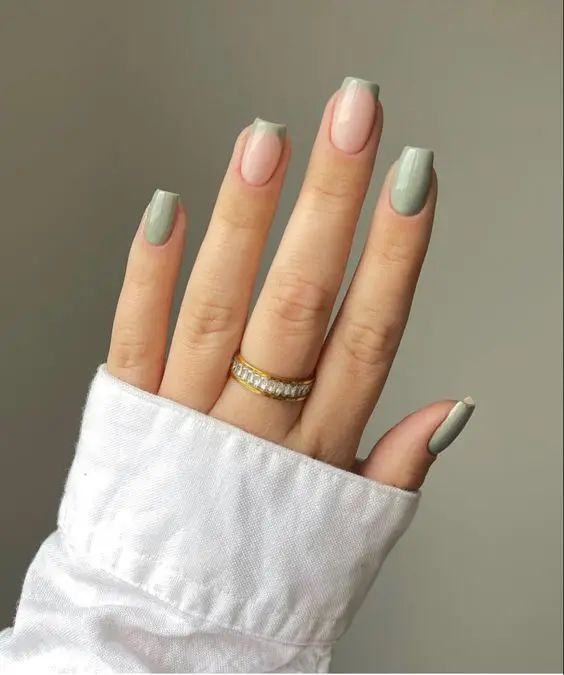 Elegant Chic Nail Design in Muted Green and Soft Nude Shades.