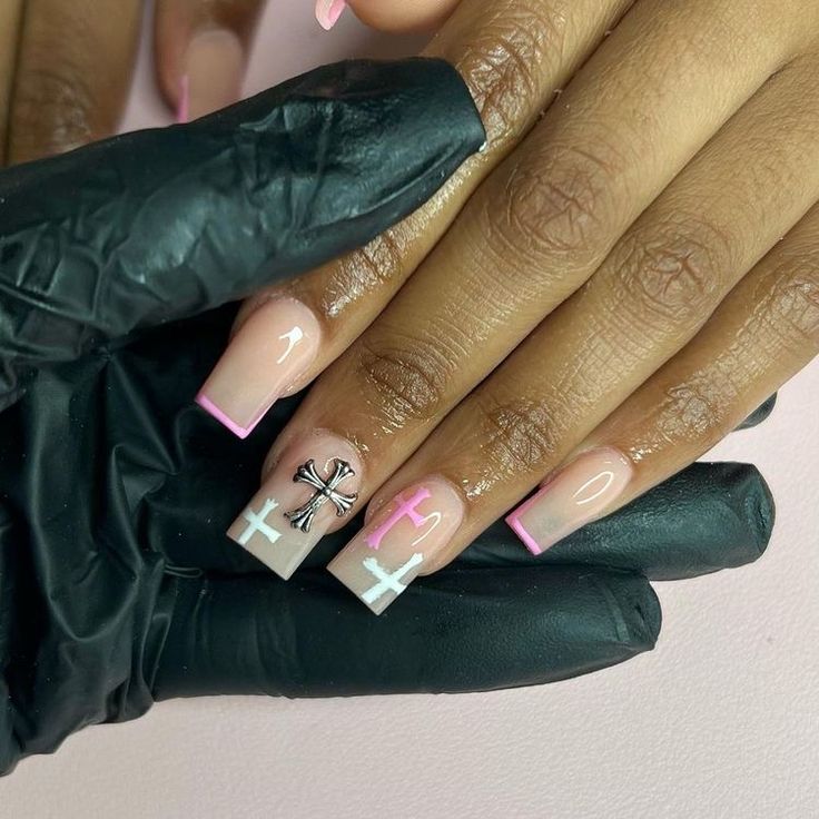 Sophisticated Nail Design: Soft Nude Base with Vibrant Pink Tips and Geometric Accent Patterns.