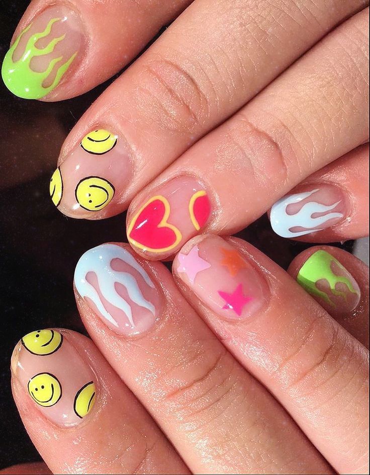 Vibrant Nail Designs with Playful Motifs and Trendy Flame Patterns for Statement-Making Artistry.