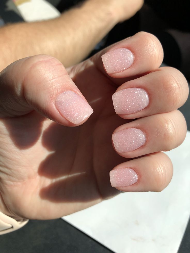 Elegant Soft Pink Sparkle Nail Design for a Sophisticated Look