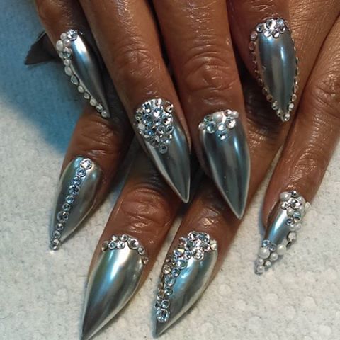 Elegant Silver Almond-Shaped Nails with Rhinestone Embellishments for Glamorous Occasions