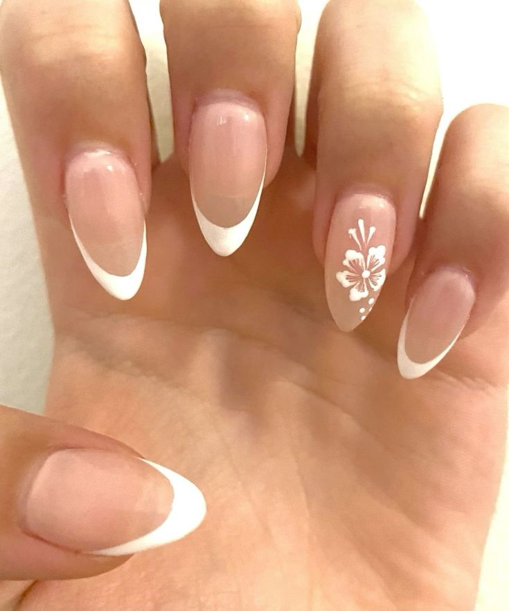 Chic Floral French Manicure: Elegant Nude Base with Crisp White Tips.