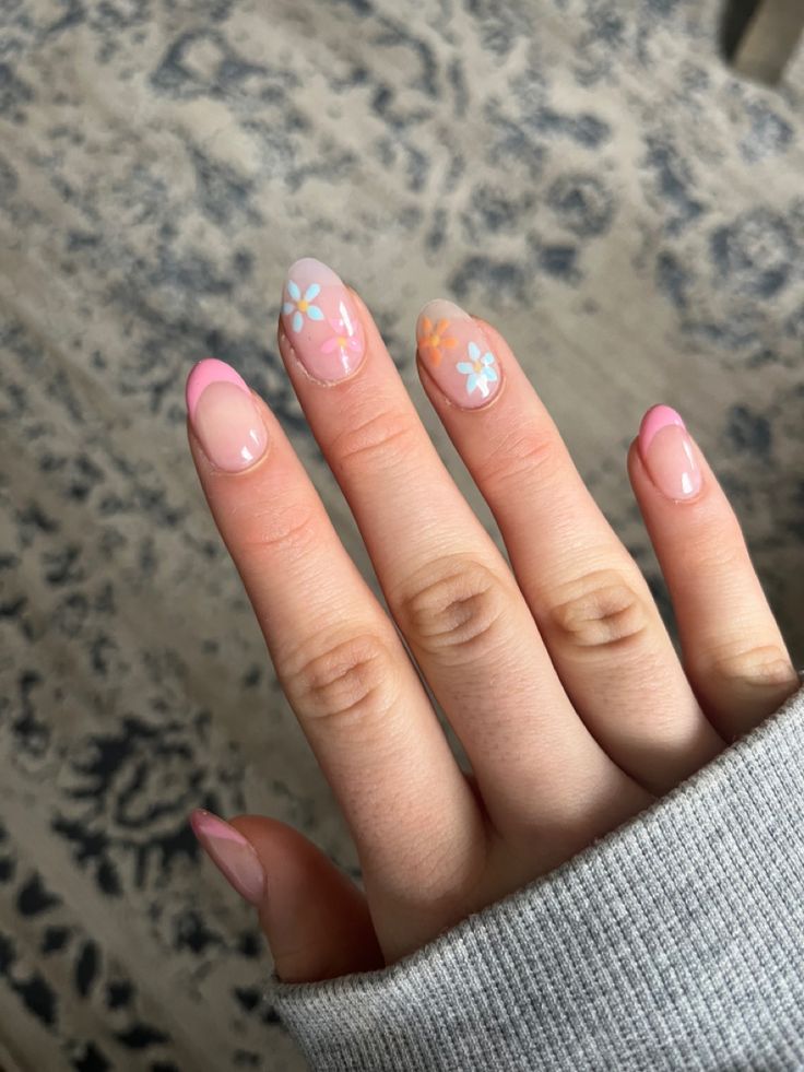 Elegant Floral Accents in Soft Pink and Peach Nail Design