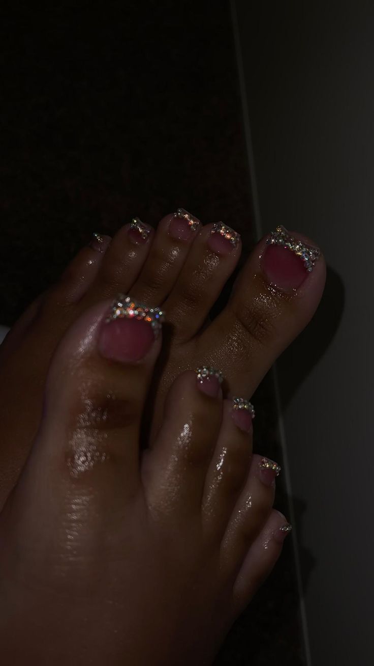 Elegant Glittering Pink Pedicure with Rhinestone Accents.