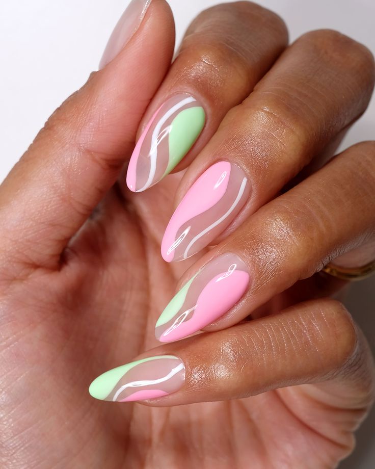 Playful and Sophisticated Pastel Nail Design with Wavy Patterns.