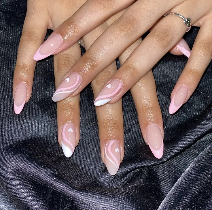 Chic Almond-Shaped Nails: Soft Pink with Elegant White and Deeper Pink Swirls