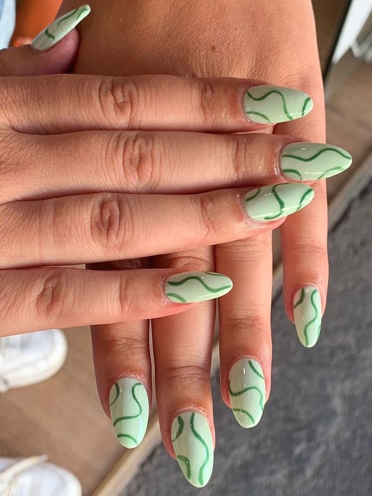 Trendy Green Nails: A Playful and Modern Manicure Idea with Wavy Designs.