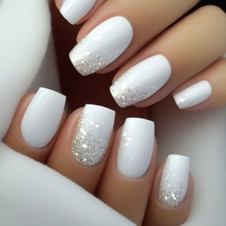 Elegant Gradient White Nail Design with Sparkling Glitter Tips for Sophisticated Glamour.