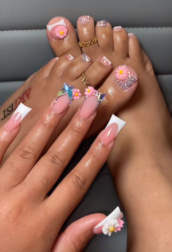 Charming Soft Pink Floral Nail Design with Glam Glitter Accents and Coordinating Pedicure.