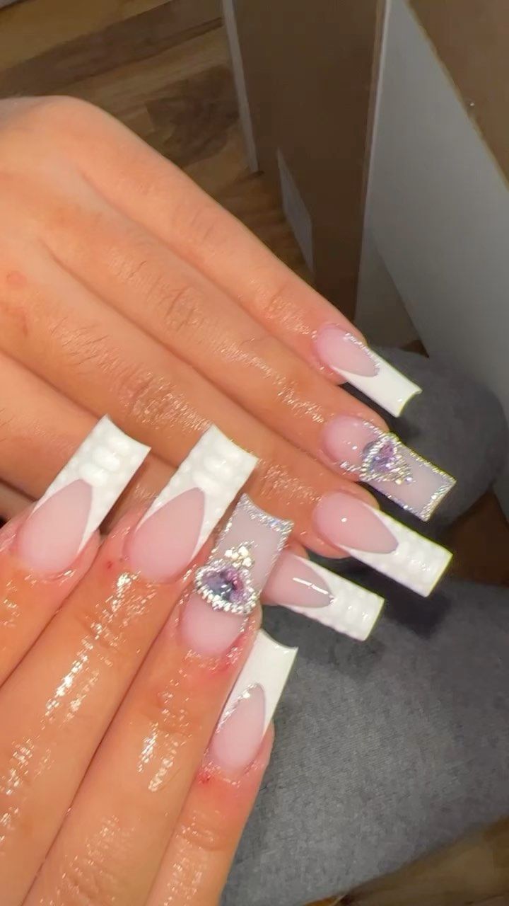 Chic Elegant Nail Design with Pastel Colors, Marble Effect, and Jewel Embellishments.