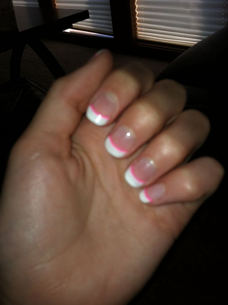 Modern French Tip Nail Design with Vibrant Pink Accents.