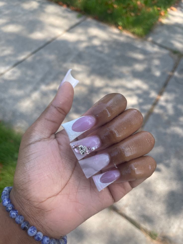 Chic Pink and Clear Tip Nail Design with Glamorous Gem Accents