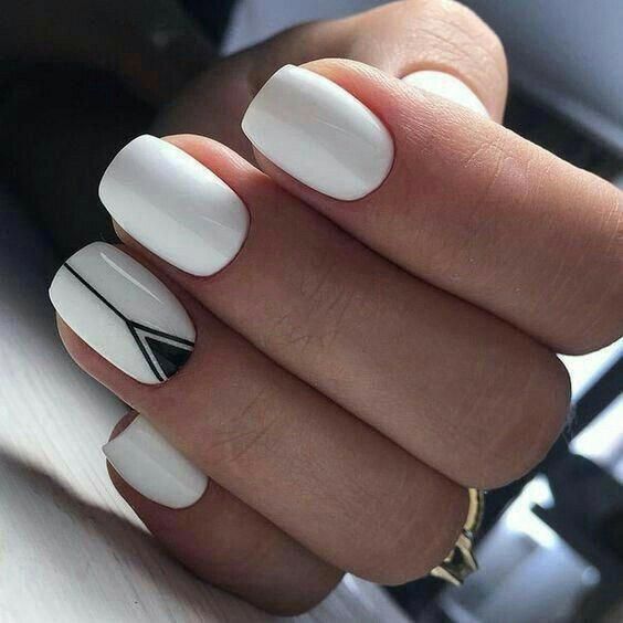 Chic Minimalist White Nail Design with Striking Black Geometric Accent.