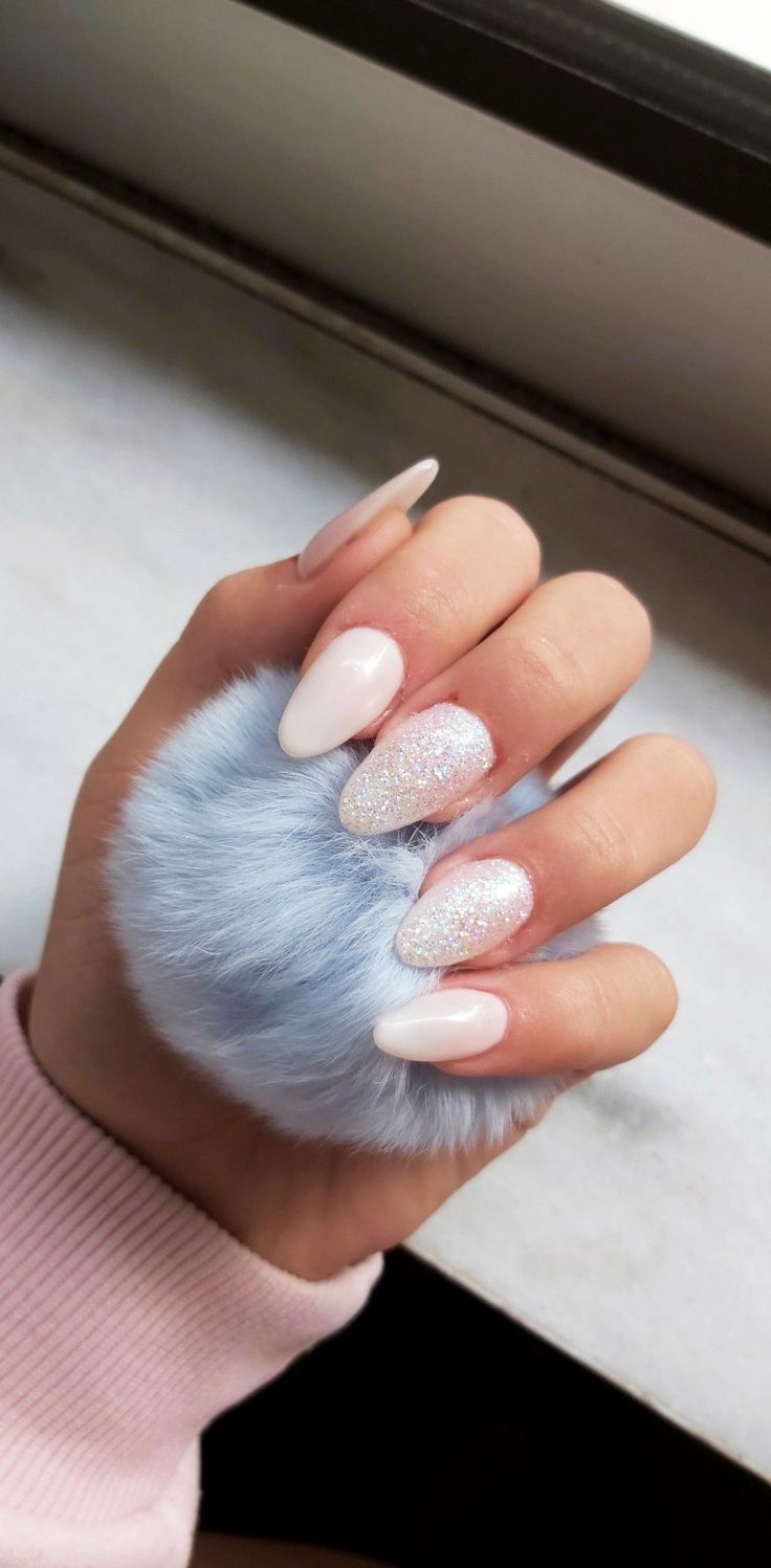 Chic and Playful Nail Design with Soft White and Glittery Pink Accents