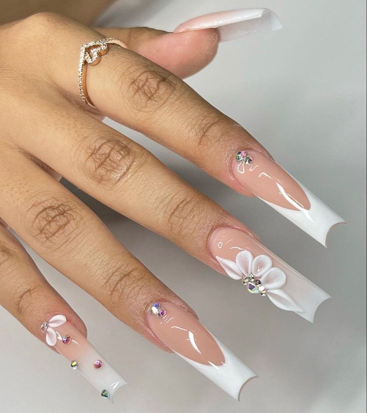 Chic Elegance: Long Square Nails with Glossy French Tips and 3D Floral Accents.