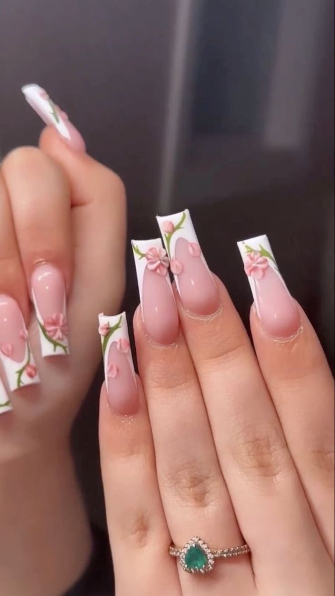 Delicate Spring-Inspired Floral Nail Design with Glossy Finish and Green Accents.