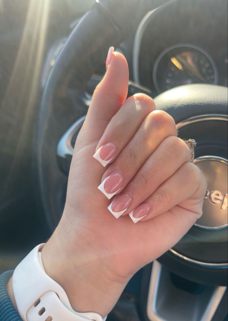 Timeless Elegance: Classic French Manicure with Soft Pink Base and Crisp White Tips.