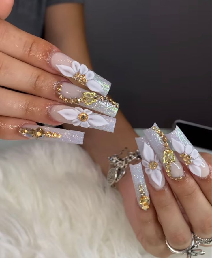 Sophisticated Coffin Nails: Elegant Floral Designs with Glitter and Gems