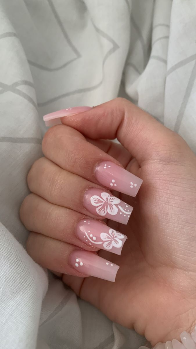 Elegant Floral Ombre Nail Design with Whimsical Accents