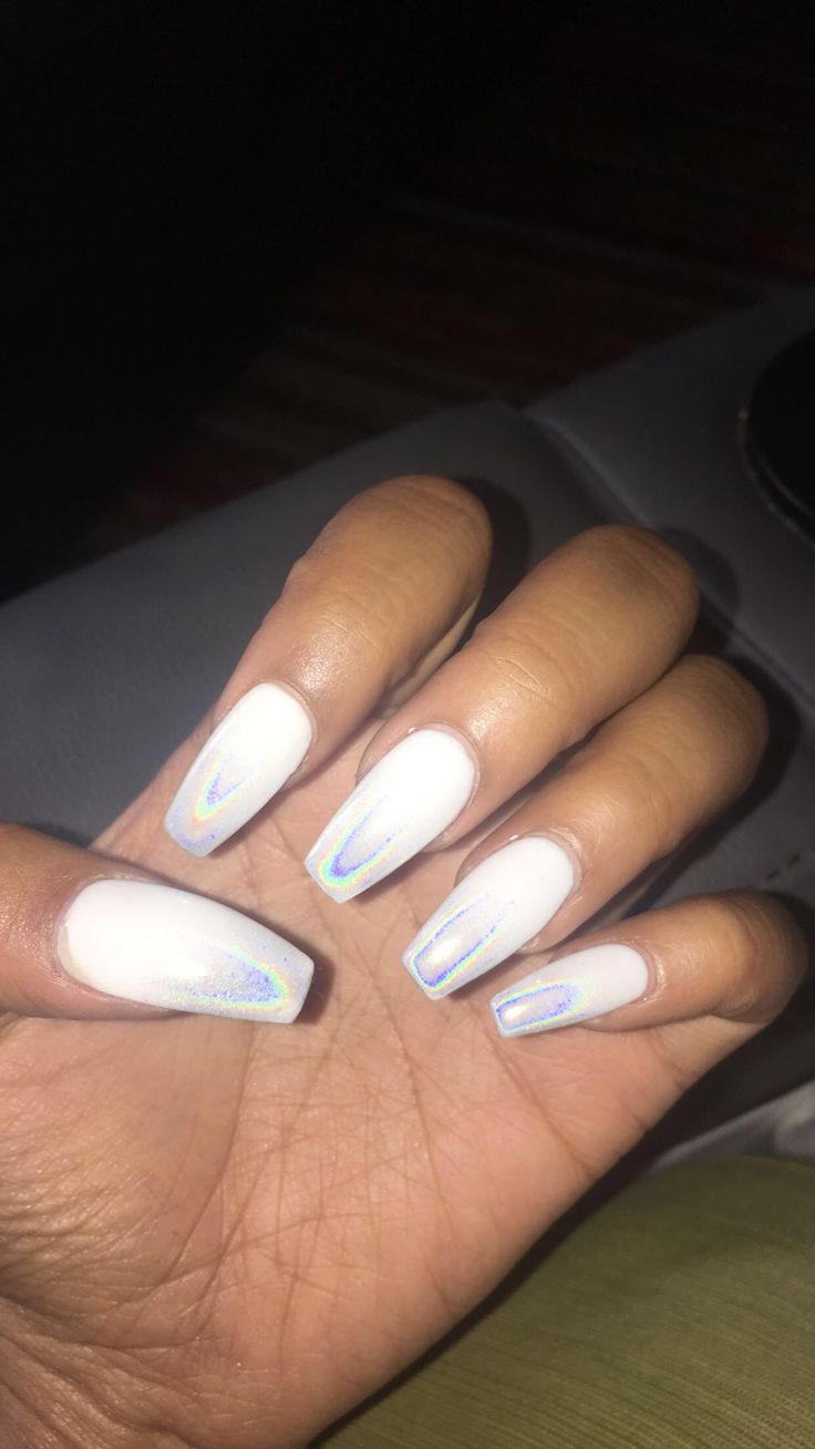 Chic White Nail Design with Radiant Holographic Triangle Accents