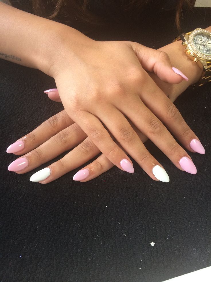 Chic Almond-Shaped Nails with Soft Pastel Pink and White Accents for a Trendy Look.