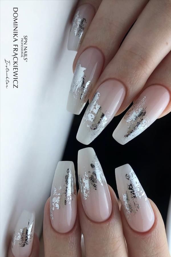 Chic Nude and White Nail Design with Striking Silver Foil Accents.