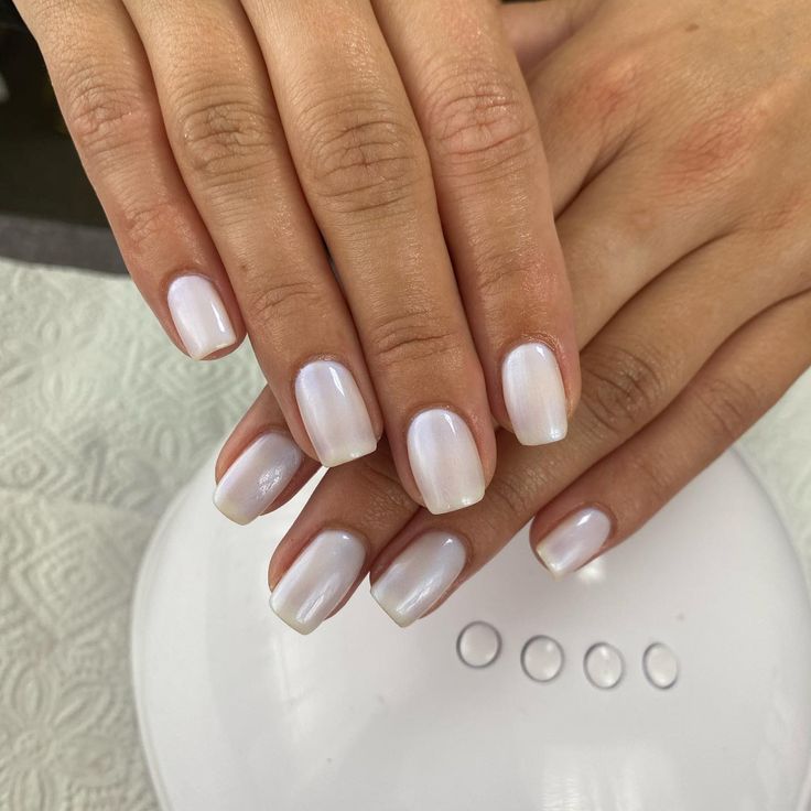 Sophisticated Ombre Nails with Soft Sheer White Finish for Effortless Elegance.