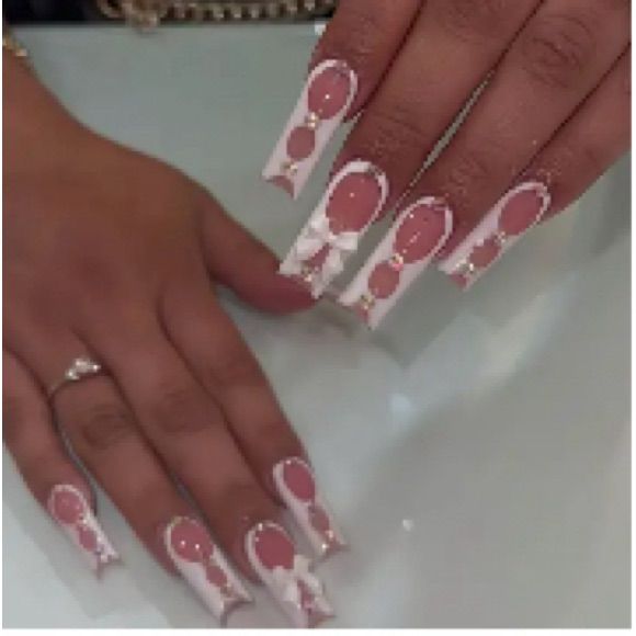 Sophisticated Elongated Square Nail Design in Soft Pink and White with Playful Circular Accents.