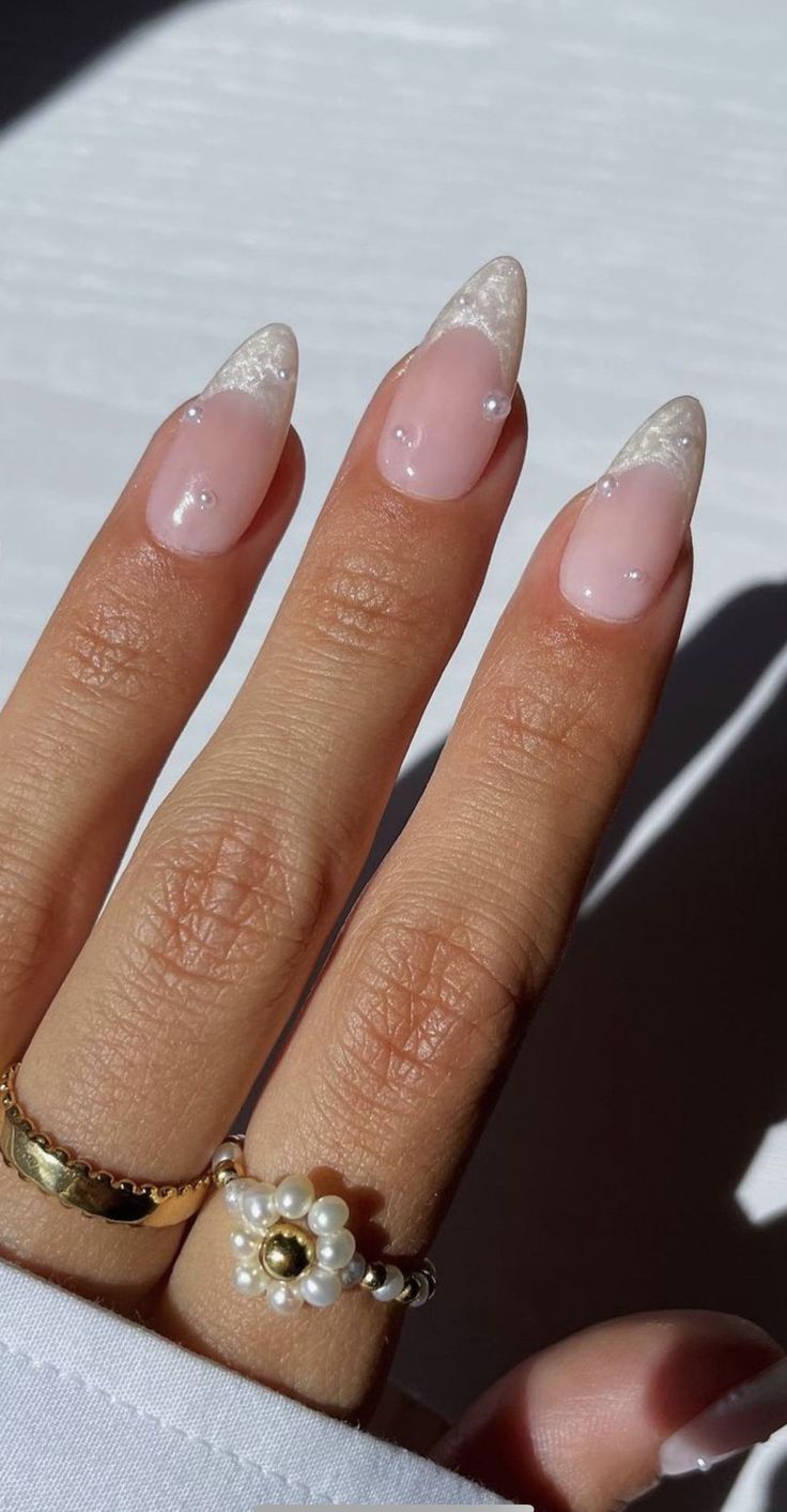 Chic Almond-Shaped Nails: Soft Pink Base with Delicate White Tips for Elegance.