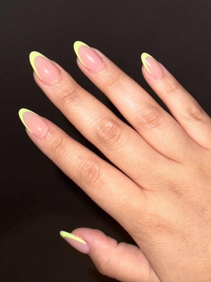 Chic Neon Yellow French Almond Nail Design with Nude Base.