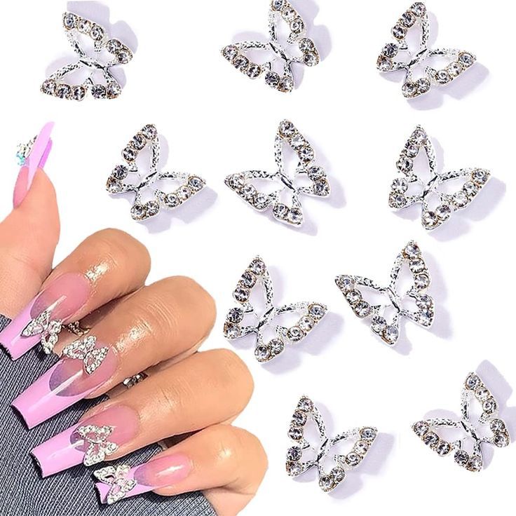 Elegant Soft Pink Nail Design with Sparkling Butterfly Accents