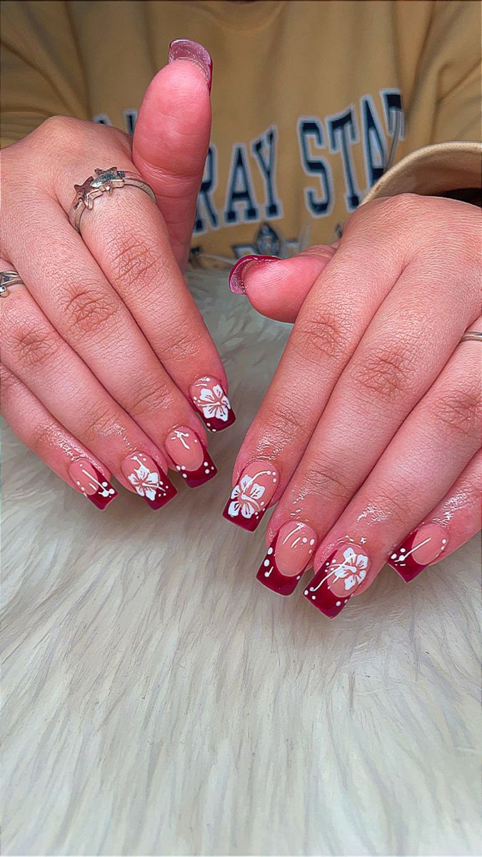 Sophisticated Deep Red and Soft Pink Floral Nail Design with Glossy Finish